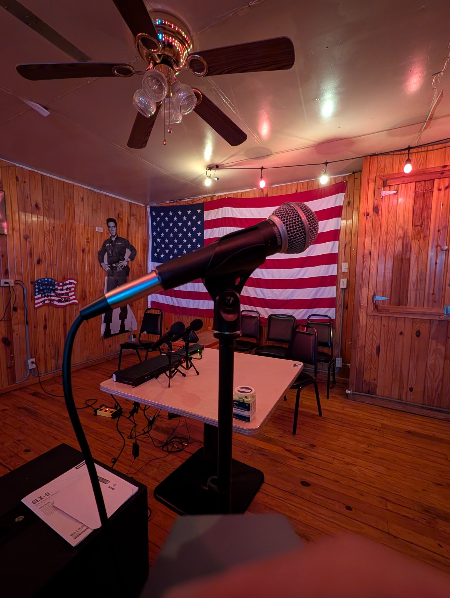 Wireless microphones ready in front of the DJ rig